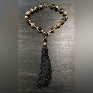Vintage, beaded necklace with fabric tassel
